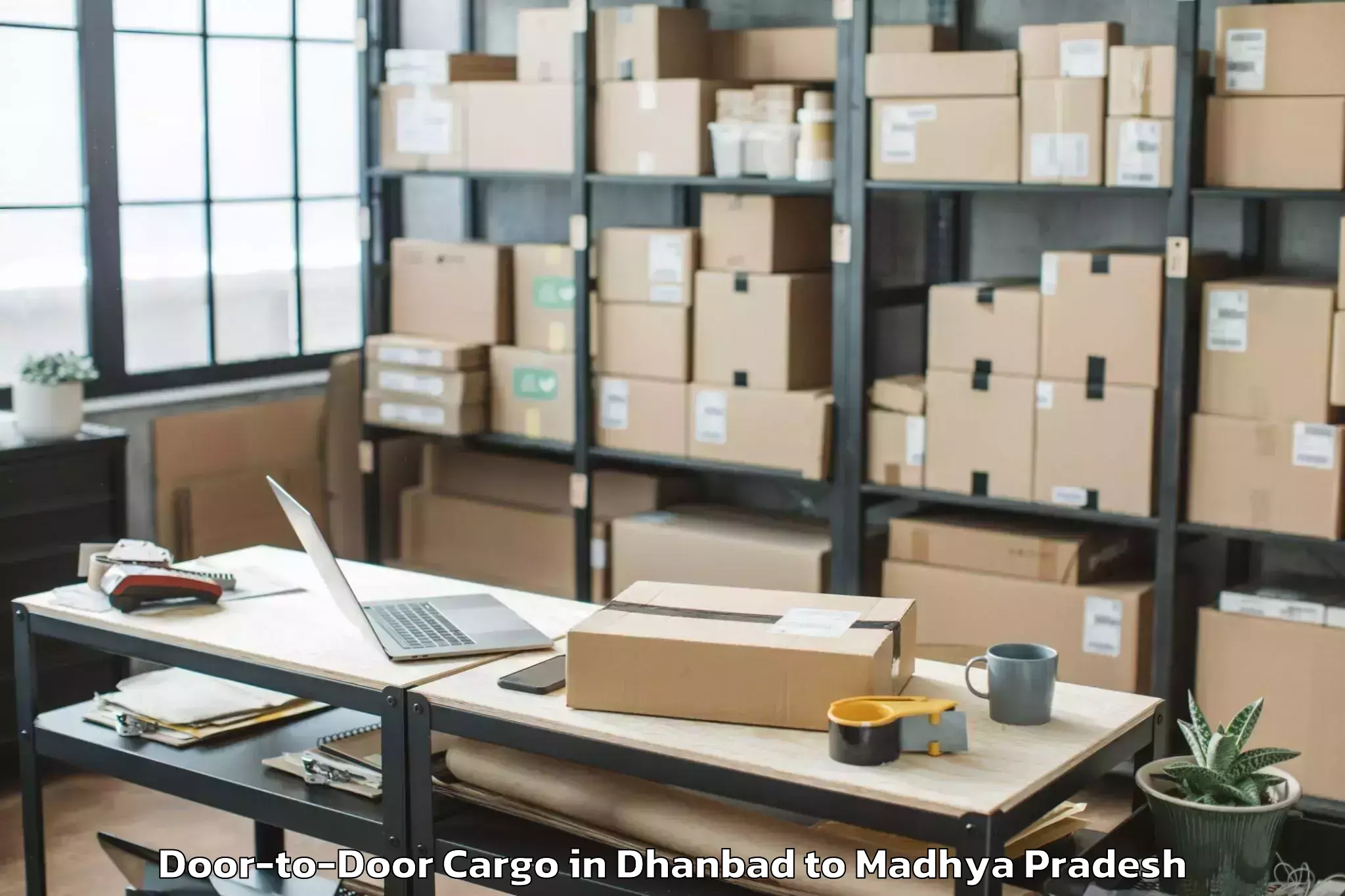 Get Dhanbad to Badnawar Door To Door Cargo